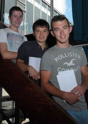 GCSE results day at Dinnington Comprehensive, pictured are Joel Wakefield, Ross Tenny and Sam Brookfield (w130822-3b)