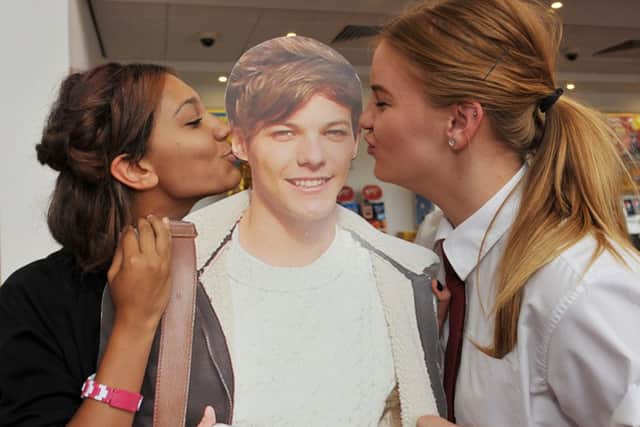 One Direction fans at the screening of the bands new film, cinema staff get caught up in the excitement (w130904-4c)