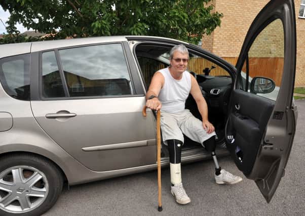 Double amputee Tim Griffith had problems obtaining a new blue badge despite having been given lifelong immunity against parking restrictions (w130903-3b)