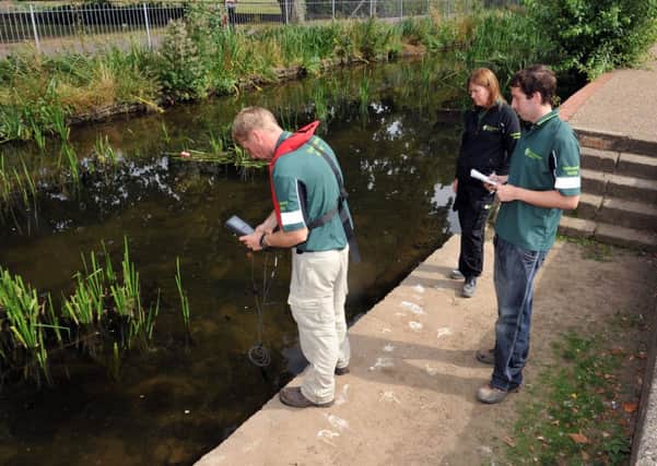 Enviroment Agency officers testing the water for pollution in the River Ryton, near the Canch.  Pictured from left are Darren Martin, Jo Ball and Graham Aspinall (w130904-4c)