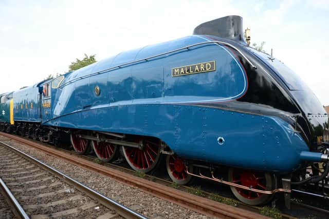 Steam locomotive Mallard came through Lea Road station hauled by a Deltic deisel locomotive on way from York Railway Museum to Grantham for event there as part of Mallard's 75th anniversary of its speed record G130904-1c