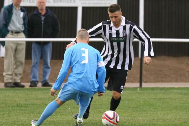 Retford United 0-0 Worksop Parramore
7 September 2013
Toolstation NCEL Premier Division
Scott Bibby looks to get past Richard Tootle in the Retford v Parramore game.
Football images from Retford United v Worksop Parramore, Toolstation NCEL Premier Division, The Jones & NCo Stadium, Cannon Park, Retford, England, UK, GBR. 7 September 2013. Image copyright Jon Knight Freelance Photography. No images may be reproduced without prior permission.