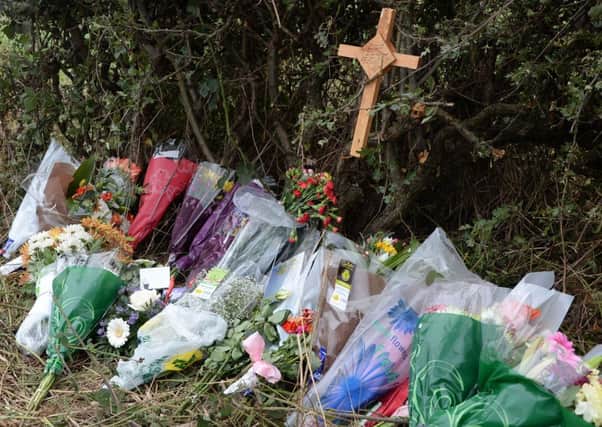 Flowers at the scene of a fatal road traffic crash on the A638 near Retford G130917-3b