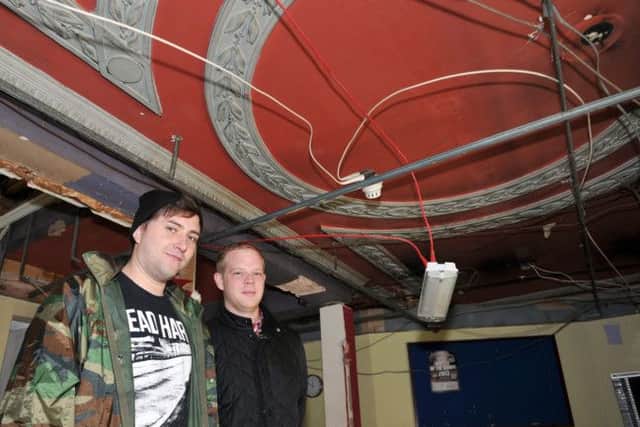 Renovation work has started at The Regal to transform it into a multi-use entertainment centre, ceilings are being stripped out to reveal ornate original features and restore the building to its former glory. Pictured are Martin Gilfoyle and Steve Broadbent (w130916-8d)
