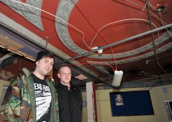 Renovation work has started at The Regal to transform it into a multi-use entertainment centre, ceilings are being stripped out to reveal ornate original features and restore the building to its former glory.  Pictured are Martin Gilfoyle and Steve Broadbent (w130916-8d)
