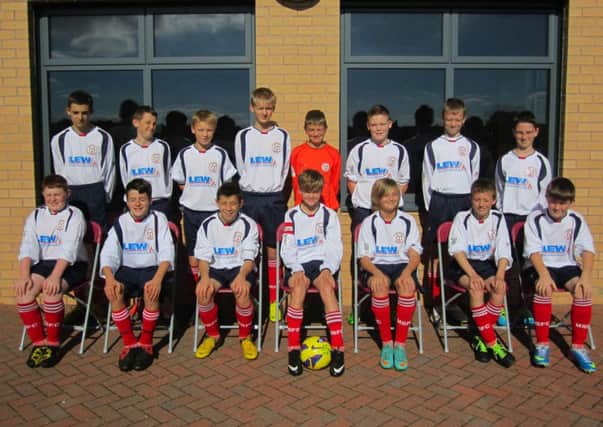 Marshall Sports U13 boys in their new kit sponsored by local company LEW (Lincs Electrrical Wholesalers)
