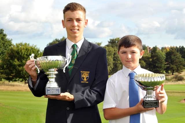 Brad Tomlinson winner of the Worksop Guardian Lee Westwood Junior Golf Championship Scratch Winner pictured with Tony Smith Handicap Champion (w131005-1c)