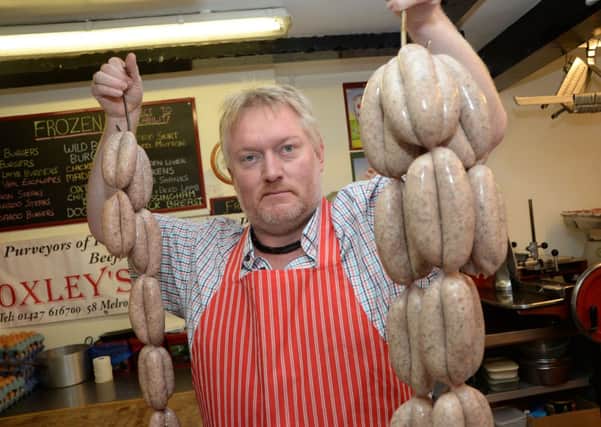 Dave Wrather from Oxley's Butchers in Gainsborough is celebrating National Sausage Week G131025-4a