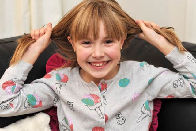 Tia Smallwood, eight, shaved off her locks for Children in Need and The Little Princess Trust (w131114-4a)