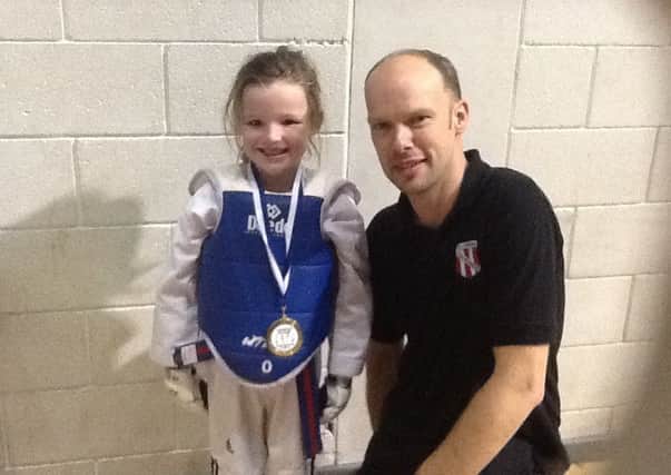 Holly Frost with her coach Ian Fairhurst