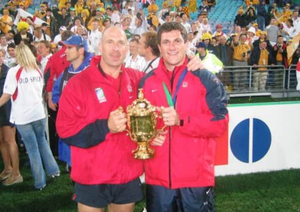 Phil Pask, left, with Paul Grayson of Northampton and England, in 2003