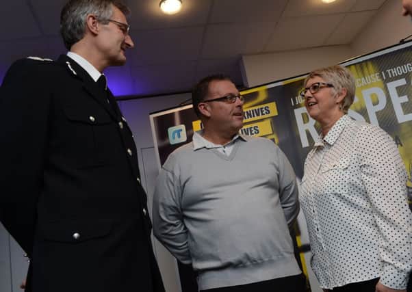 Marie and Kevin whos son was a victim of an air weapon incident with Chief Constable David Crompton and Deputy Crime Commisssioner Tracy Cheetham