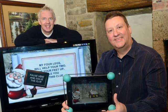 FESTIVE FUN Liam Donohoe and Andy Taylor with their HidemyPresent app. (D556A350)