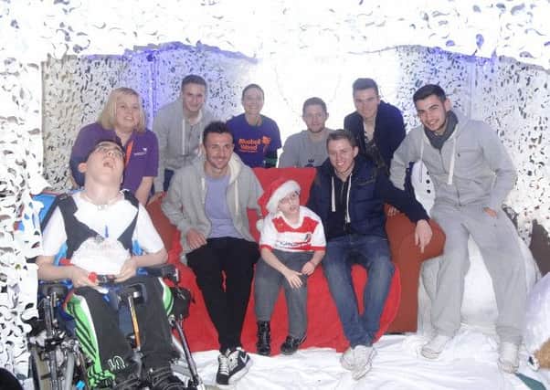 Footballers meet staff, volunteers and families and Bluebell Wood Children's Hospice