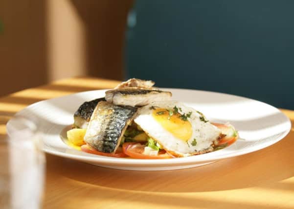 Seabass with Bombay potatoes and fried egg.  PA Photo/Fish is the Dish.