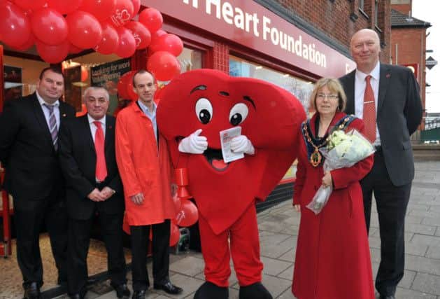 Opening of new British Heart Foundation furniture and electrical store, pictured are from left area manager Chris Ward, Store manager Mark Shortland, BHF researcher at University of Sheffield Dr Tim Ellam, Coun Sybil Fielding and regional manager Barry Greenstreet 
(NWGU-07-01-14 RA 1)