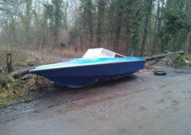 Local residents reported this speedboat dumped at the side of the road