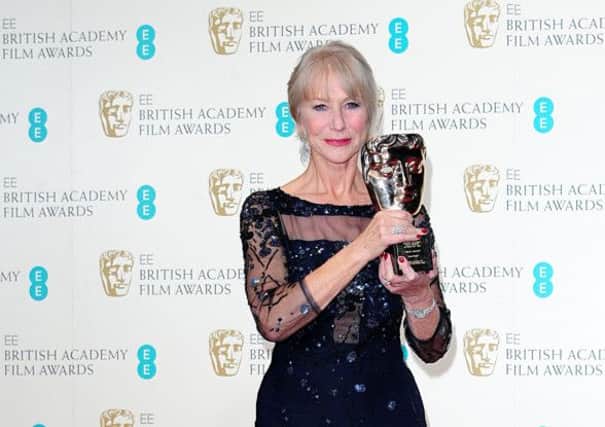 Dame Helen Mirren with the Bafta Fellowship award, in the press room at The EE British Academy Film Awards 2014, at the Royal Opera House, central London. PRESS ASSOCIATION Photo. Picture date: Sunday February 16, 2014. See PA story SHOWBIZ Bafta. Photo credit should read: Ian West/PA Wire