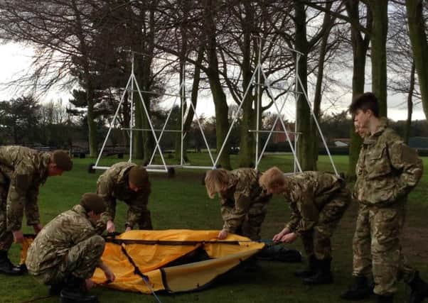 Dukeries cadets practice putting up a tent ahead of their Easter camp