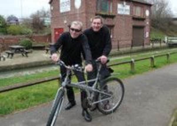 Dave Berry (left) with friend Jeff Troops, who will be cyciling the length of the Chesterfield Canal for charity