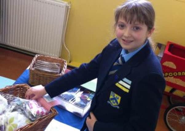 Barlborough Hall School pupil, Molly Wootton, at one of the fundraising stalls held during Good Shepherd Week.