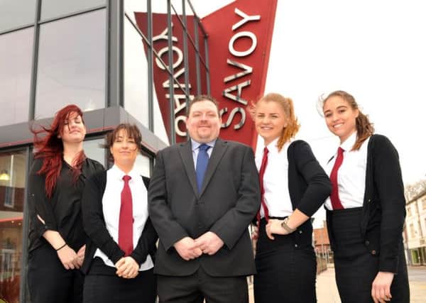 Savoy Cinema Worksop are celebrating their 2nd birthday, pictured with manager Wayne Gregory are from left supervisor Emily Marshall, Meri Isherwood, Olivia Wankiewicz and Jenna Stevens 
(NWGU-19-03-14 RA 1a)