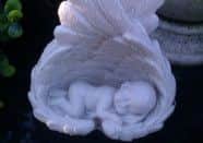 The ornament that was stole from baby Austin Hodges' grave