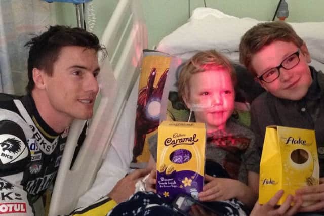 Patients at the hospital receive their Easter eggs from James Toseland
