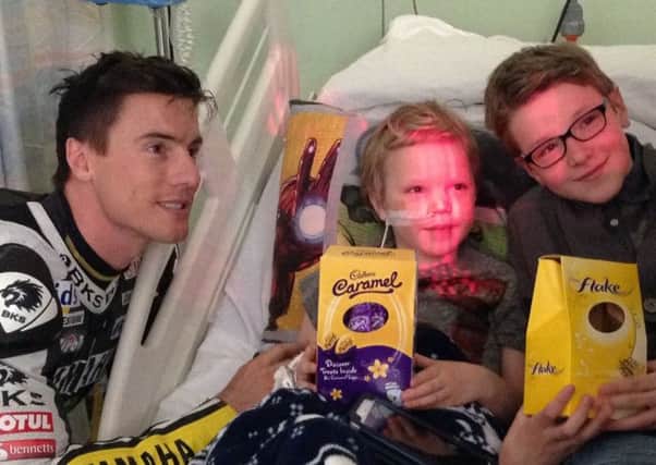 Patients at the hospital receive their Easter eggs from James Toseland