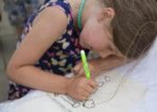 Kids could win half a day's drawing lesson with a professional artist