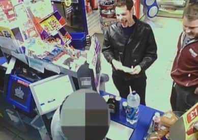 Stephen Schofield, left, and Matthew Duffy joke around as they buy booze shortly after battering Alan Easton and burying him in a shallow grave