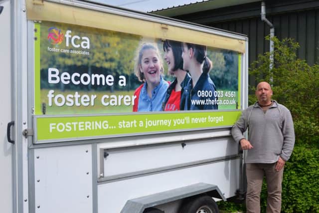 Ian Shackleton with the FCA trailer he is helping to refurbish ready for Foster Care Fortnight.