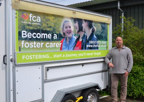Ian Shackleton with the FCA trailer he is helping to refurbish ready for Foster Care Fortnight.