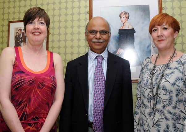 Breast cancer survivors Cath Beckett and Sian Bell  with Kadappa Kolar