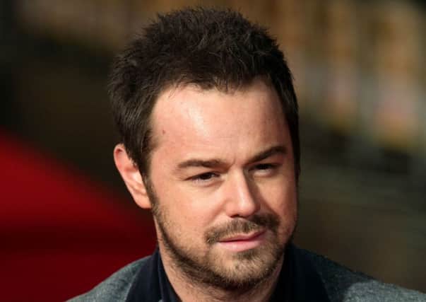Embargoed to 0001 Friday January 31

File photo dated 05/02/13 of EastEnders star Danny Dyer who said he was so nervous about joining the soap he was worried he would call his new colleagues by their on-screen names. PRESS ASSOCIATION Photo. Issue date: Friday January 31, 2014. The cockney star, who joined the long-running BBC1 show on Christmas Day as Queen Vic landlord Mick Carter, said his new role was "another level" of fame.
Appearing on The Jonathan Ross Show, he said: "I can't help but feel a bit overwhelmed by it. You're brought up watching it and all of a suddenly you are there. The other thing you worry about is calling her Dot or calling him Phil. It's weird because I was talking to Shane Richie and he called me Mick. I thought f*** that, I've been trying everything in my power not to call him Alfie and he Micked me off." See PA story SHOWBIZ Dyer. Photo credit should read: Yui Mok/PA Wire
