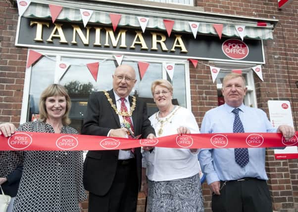 Officially re-opening Harthill Post Office are, (from left) Julia Johnson, Coun John Foden, Mrs Kath Foden, Mayoress of Rotherham and Tim Johnson

. Picture: Chris Vaughan