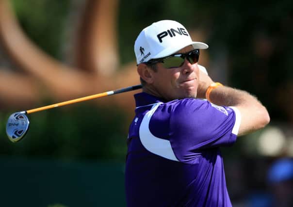 Lee Westwood must wait and see if makes the cut for the weekend  at The Open