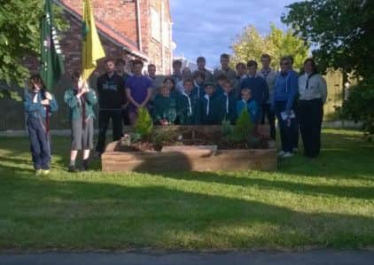 The 1st Willingham scouts have installed a planter on the village playing field in memory of Penny Dunderdale MBE.