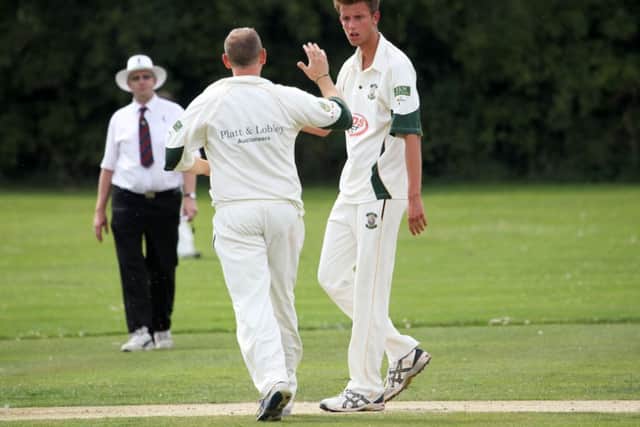 Lea Park's Andy Slater celebrates one his two wickets against Mansfield 2nd. Picture: Chris Etchells