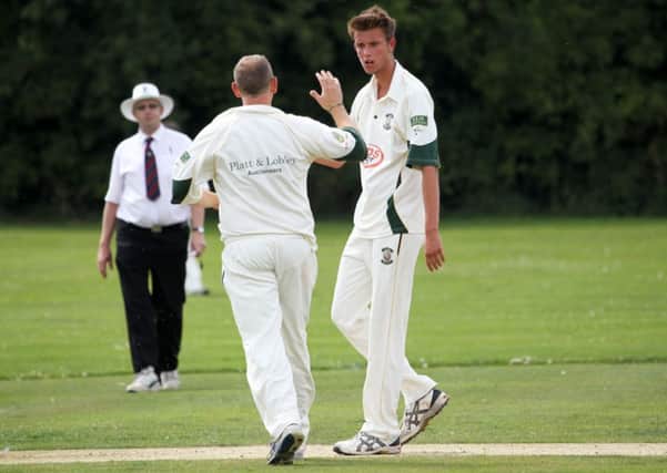 Lea Park's Andy Slater celebrates one his two wickets against Mansfield 2nd. Picture: Chris Etchells