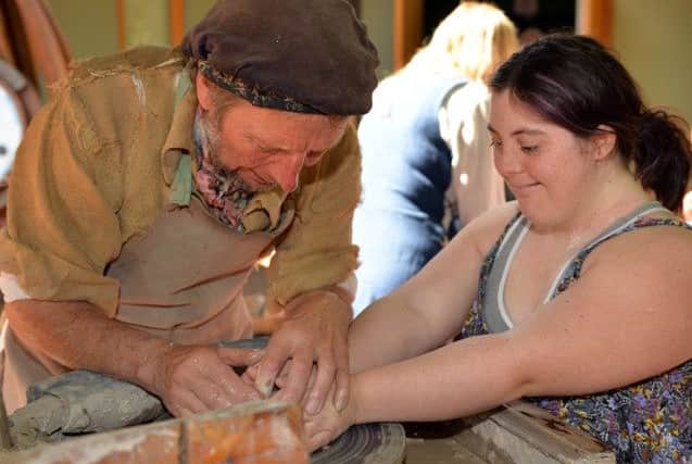 The 30th annual Robin Hood Festival at Sherwood Forest Country Park, pictured is Elisha Bramhall having a go at throwing a pot