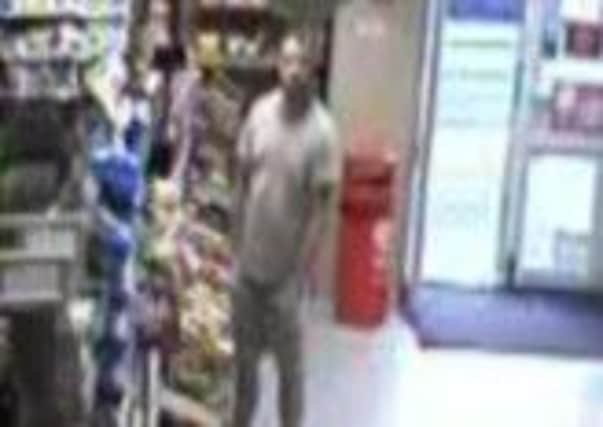 Police want to speak to this man in connection with a case of alleged racial abuse