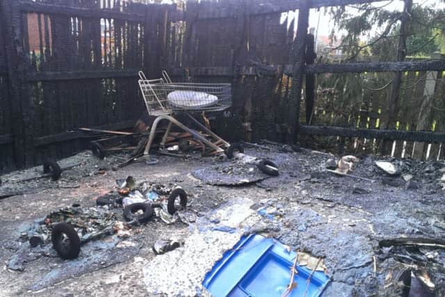 Twenty wheelie bins were destroyed by fire in a wooden compund on Woodland Court in Worksop