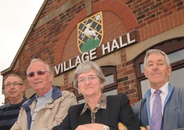 The first phase of work to refurbish the Harthill Village Hall has been completed and includes a new roof, brickwork, boiler, kitchen and lounge.  Pictured from left is Parish Clerk Les Wheatley, Parish Council Vice Chairman Ian Lloyd, Chairman Parish Council Joy Pattison and Village Hall Chairman Brian Shutt  (w120502-12b)