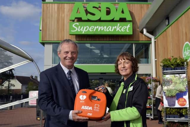 MP John Mann visits Harworth Asda to see the new public access defibrillator