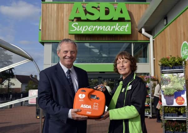 MP John Mann visits Harworth Asda to see the new public access defibrillator