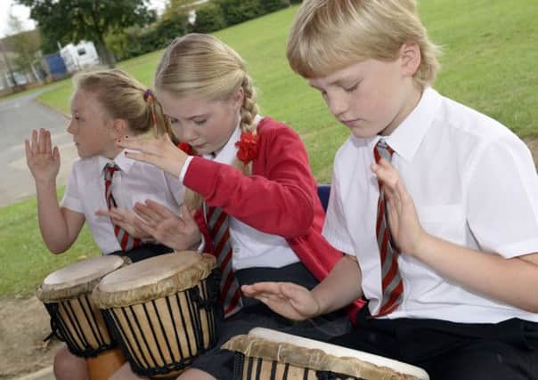 All Saints C of E Primary School have invested in a collection of African drums and children took part in a drumming workshop with Victor Scott