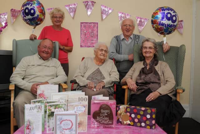 Margaret Moore celebrates her 100th birthday with her family (l-r) son John Moore, daughter-in-law Margaret Moore, son-in-law Jeffrey Perry and daughter Patricia Perry. Picture: Andrew Roe