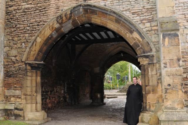 The Priory Gatehouse in Worksop is being opened to the public, as part of the National Heritage Weekend. Pictured is Father Spicer (w110908-10i)
