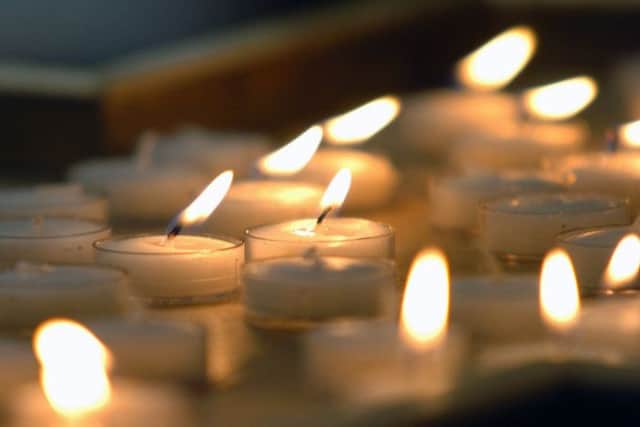 The Hospice Regional Light Up a Life, which was held at St Columbas roman Catholic Church, Castletown Road, Port ErinPeople lighting a candle to remember loved ones who have been affected by cancer